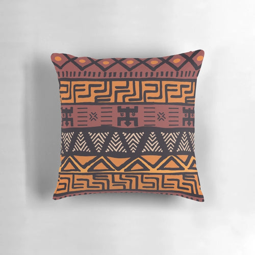 Throw pillow featuring an authentic African tribal mudcloth pattern in earth tones
