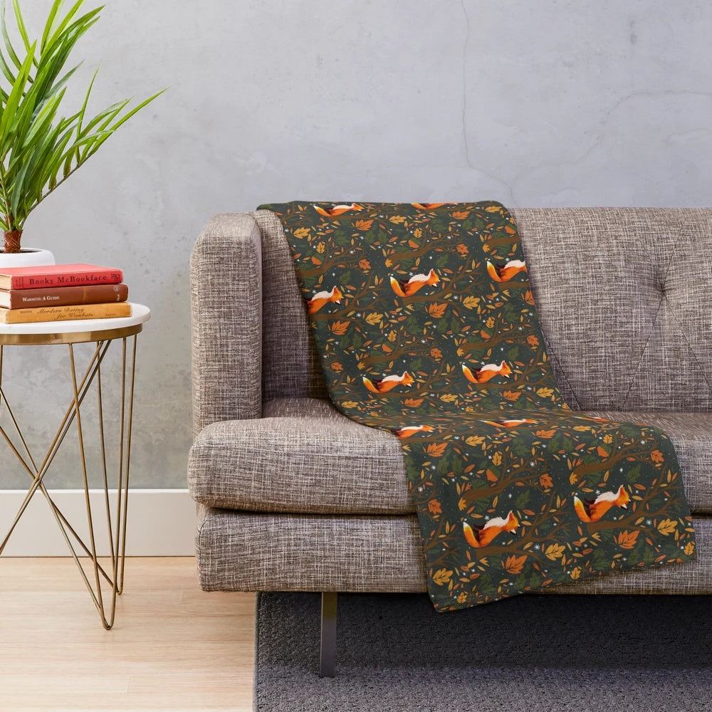 Soft, plush blanket featuring an autumn-inspired fox design