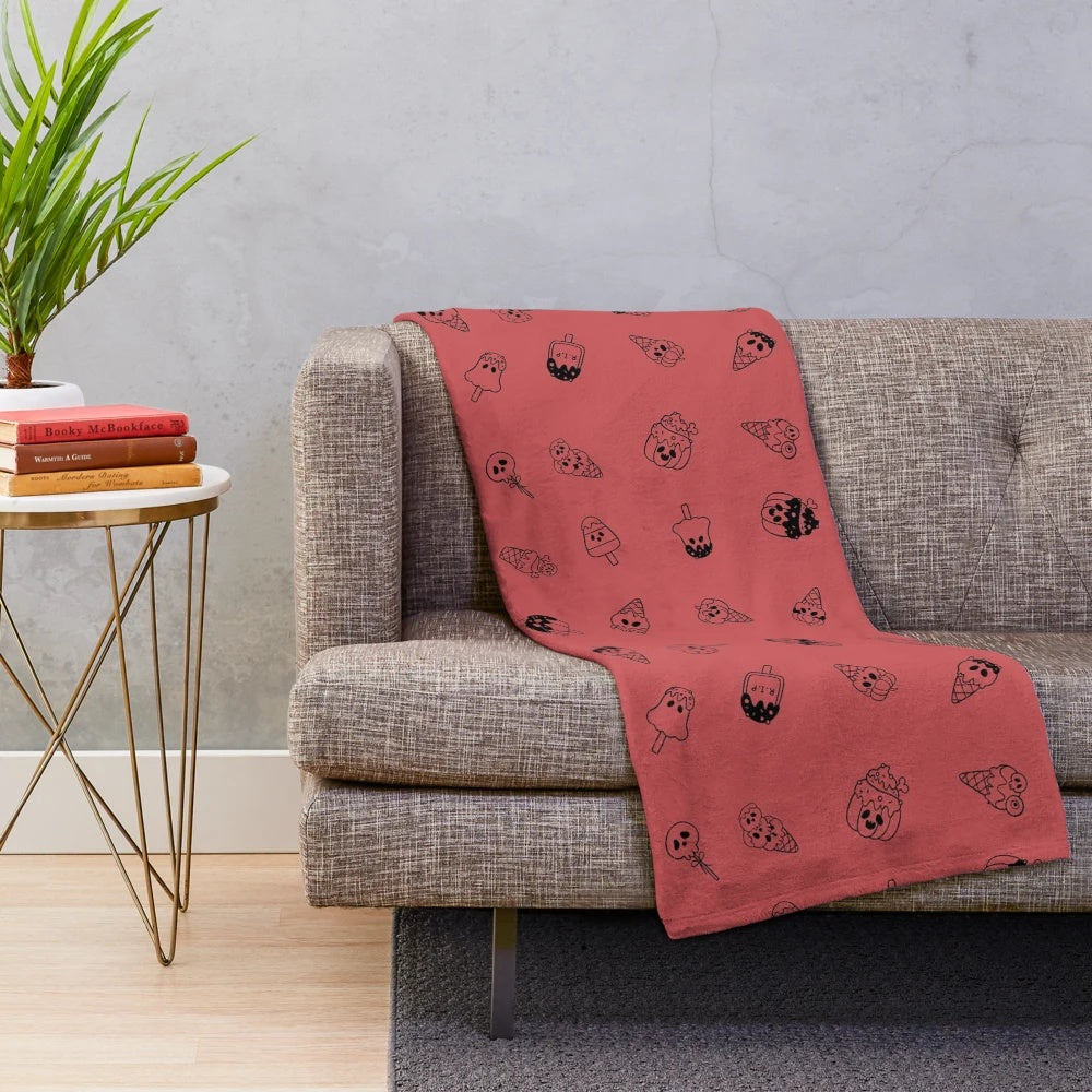 Cozy fall leaf red plush blanket with spooky ice cream design