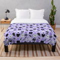 Cute witch plush blanket with pastel goth and kawaii halloween design