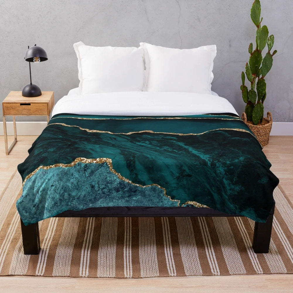 Blue and teal faux malachite marble plush blanket with a modern, abstract design