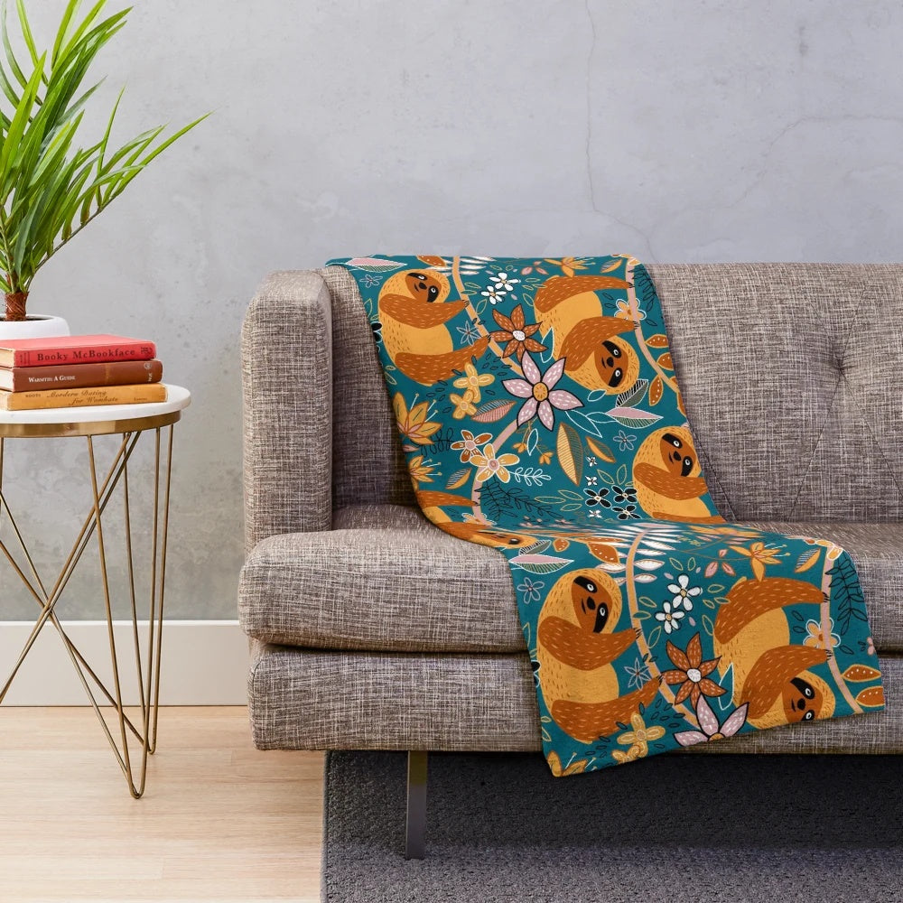 Boho sloth floral plush blanket with teal and orange pattern