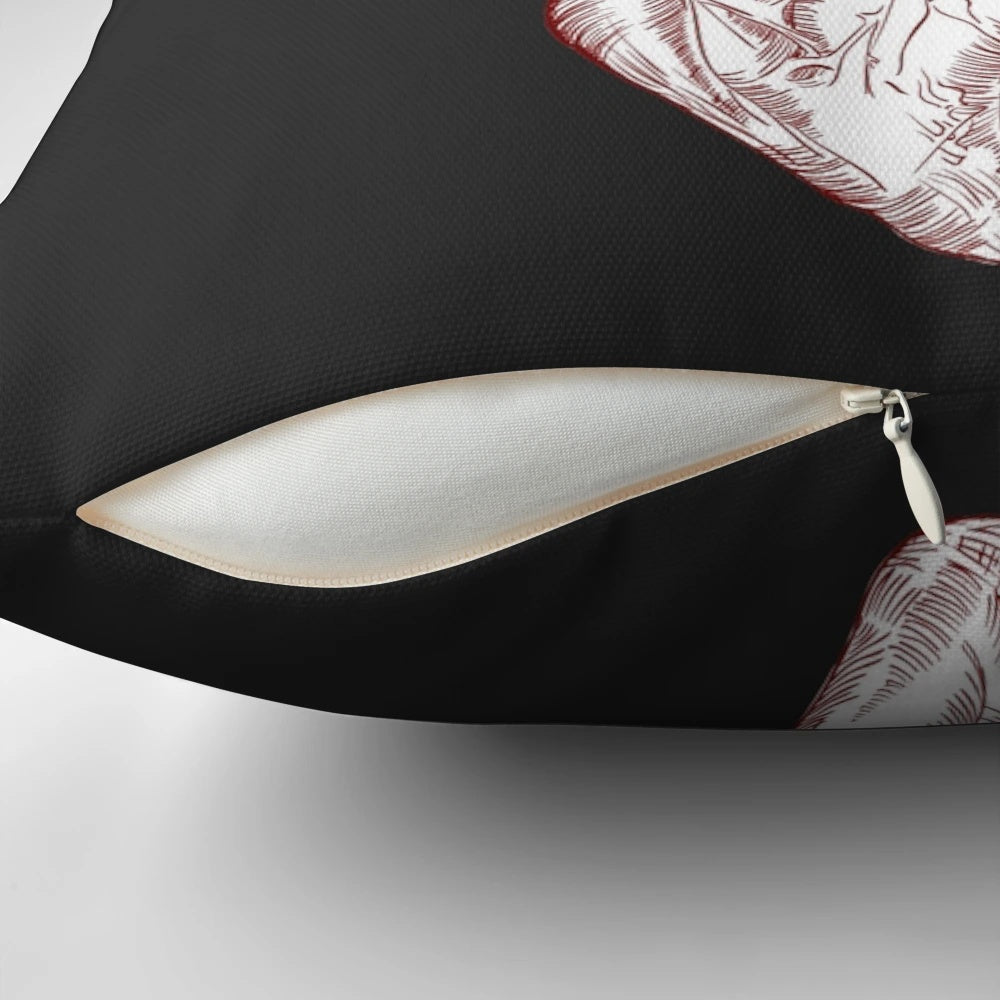 Decorative pillow featuring a detailed illustration of a human heart surrounded by delicate floral elements.