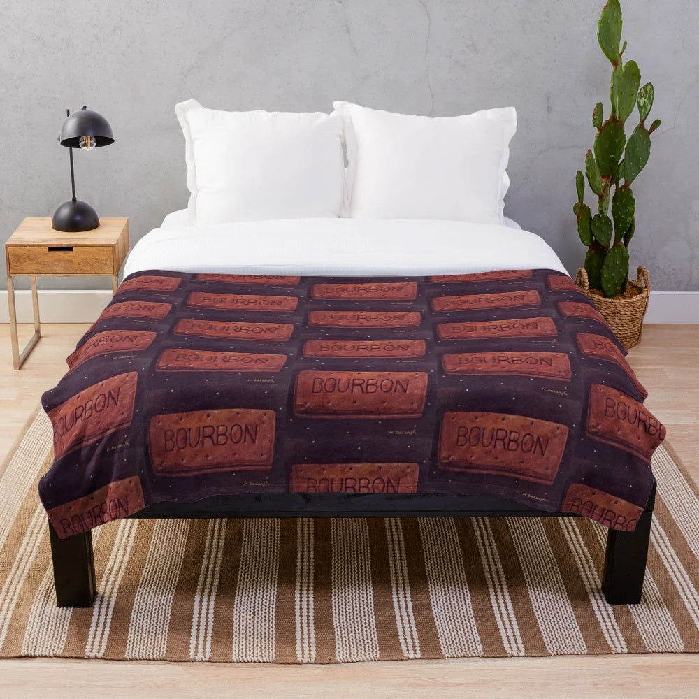 Bourbon biscuit plush blanket in a decorative oil paint effect design