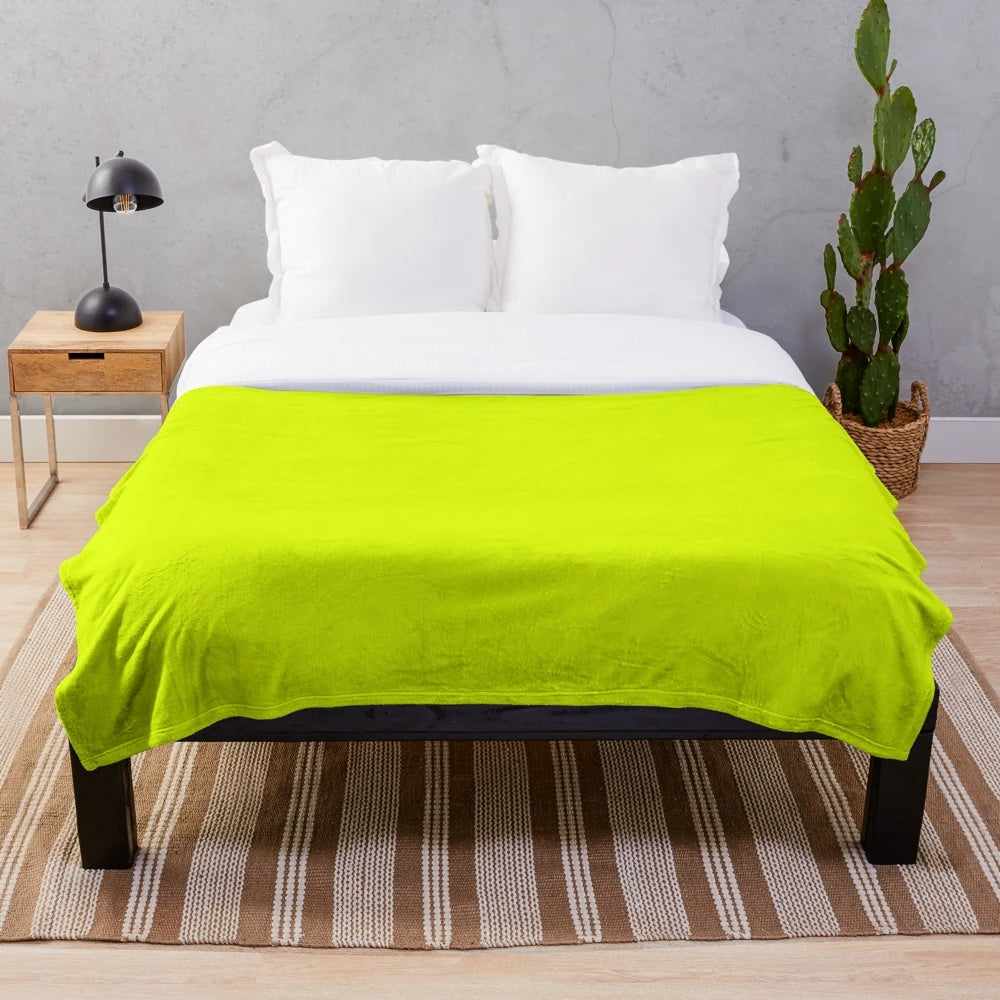 Chartreuse yellow plush blanket with high visibility and simple design