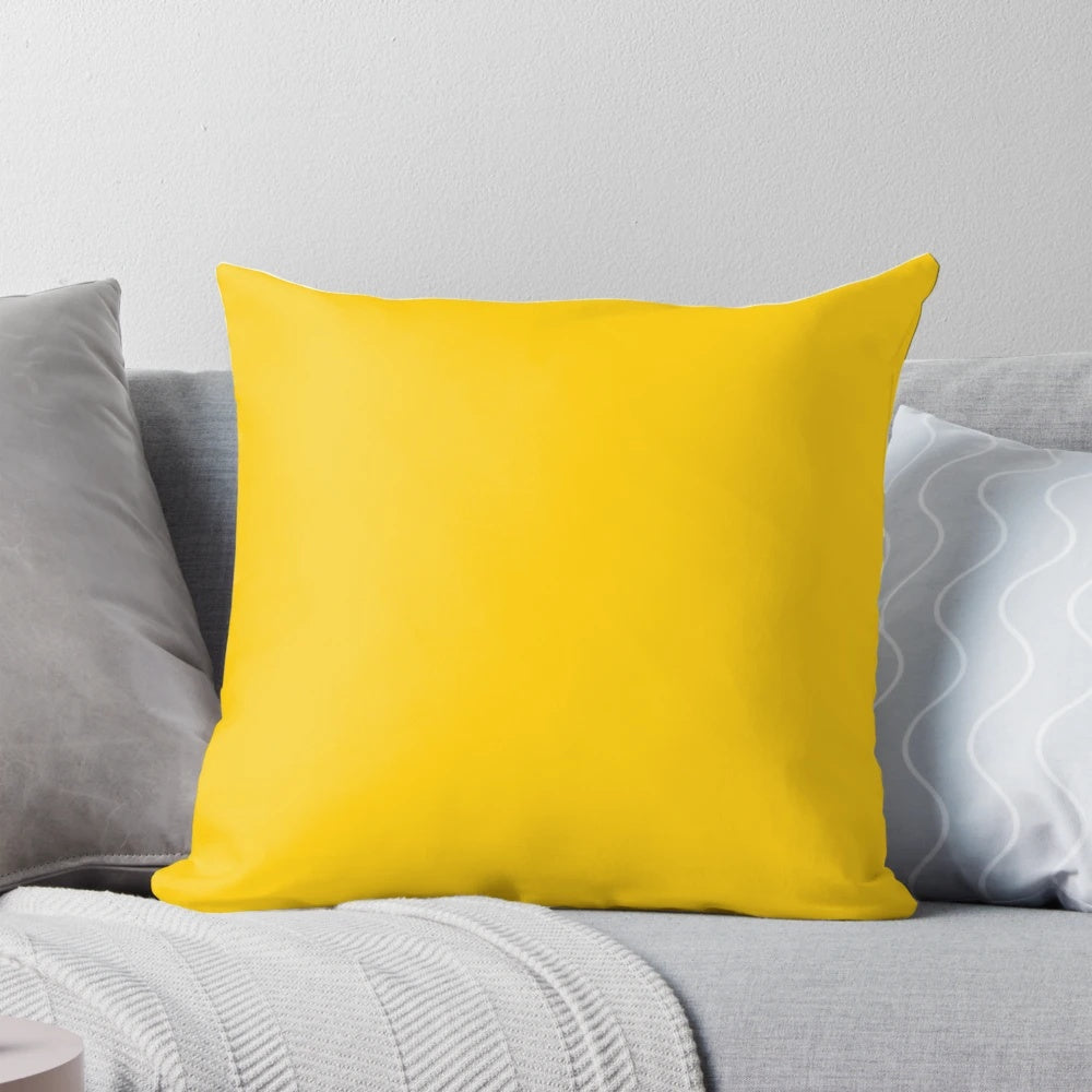 Bright yellow solid pillow with sunny, vibrant design