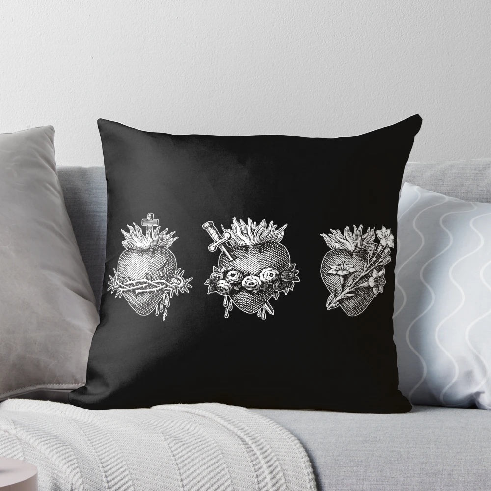 A beautiful decorative pillow featuring the sacred hearts of the Holy Family - Jesus, Mary, and Joseph.
