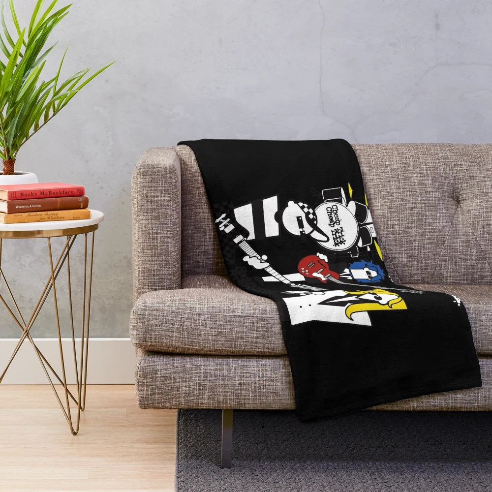 Cartoon inspired plush blanket featuring a music band