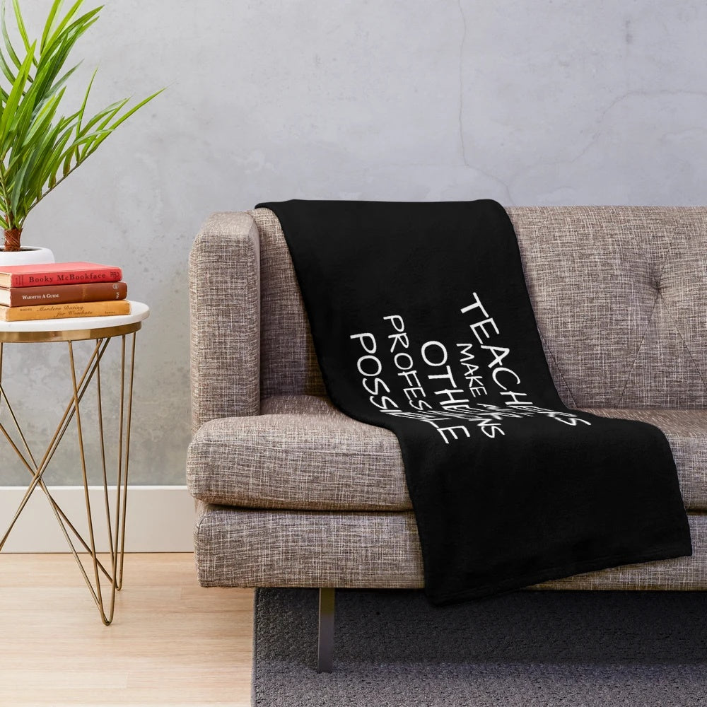 Plush blanket with text "Teachers Make All Other Professions Possible