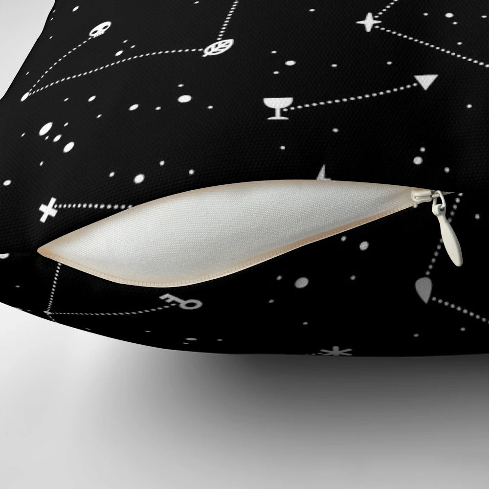 Black and white pillow with a celestial night sky pattern, featuring stars and a magical, witchy design.