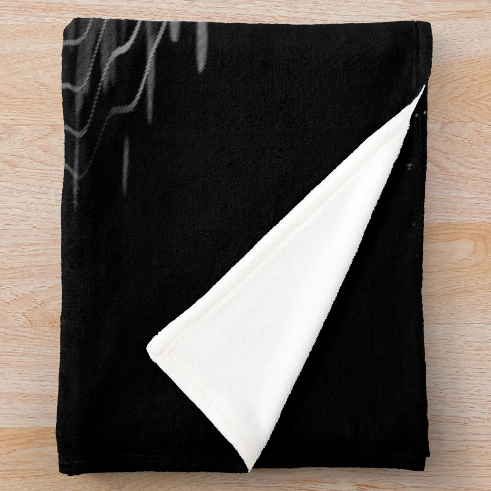 Cozy plush blanket featuring a moon and stars design