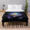 Solar system plush blanket featuring planets, stars, and galaxy design