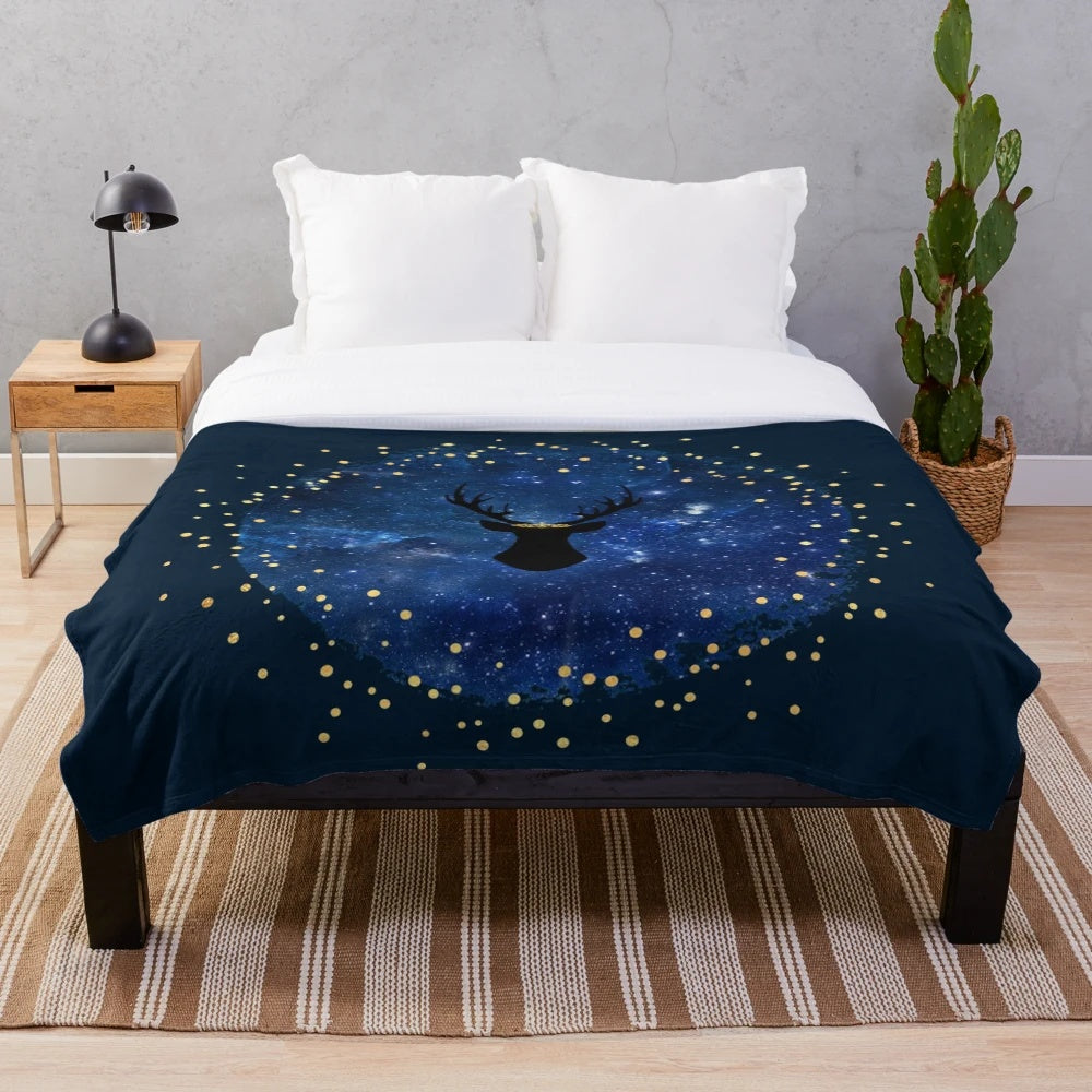 Plush blanket featuring a celestial stag design, inspired by the Throne of Glass series by Sarah J. Maas