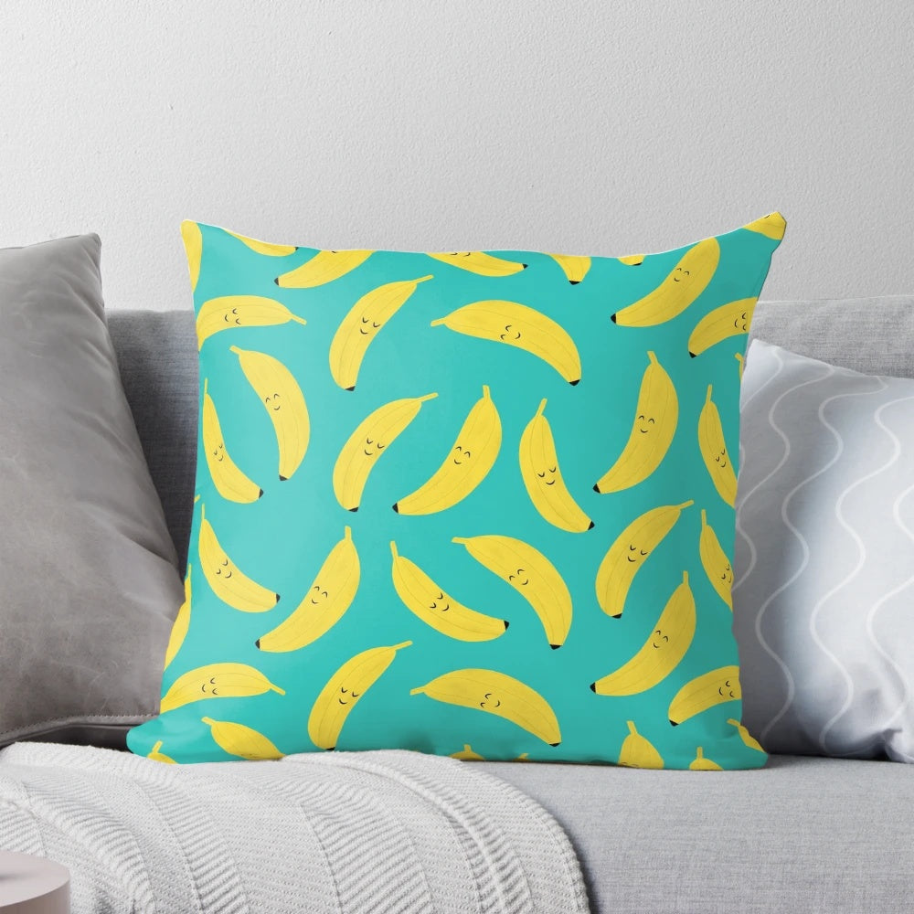 Vibrant yellow banana-patterned pillow with a happy, cartoon-like design