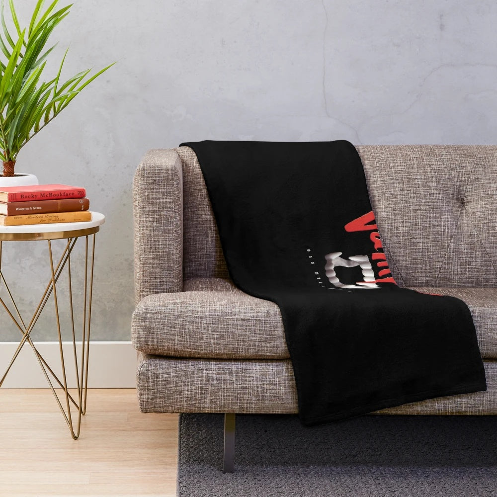 Gothic vampire-inspired plush blanket with Count von Krolock design