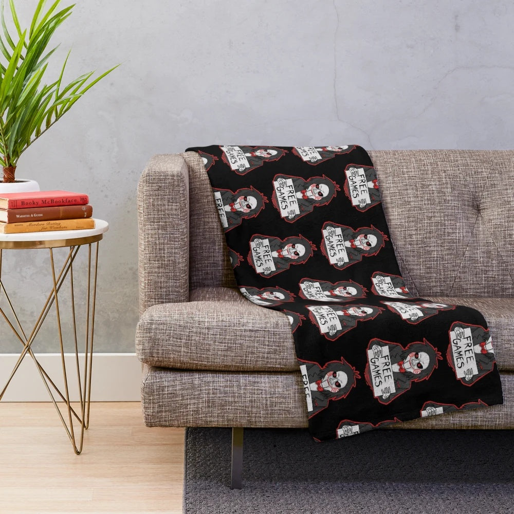 Plush horror-inspired blanket featuring the iconic Billy the Doll character