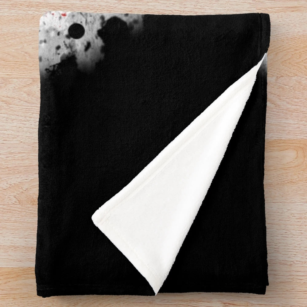 Plush blanket featuring the iconic Jason Voorhees character from the Friday the 13th horror movie franchise