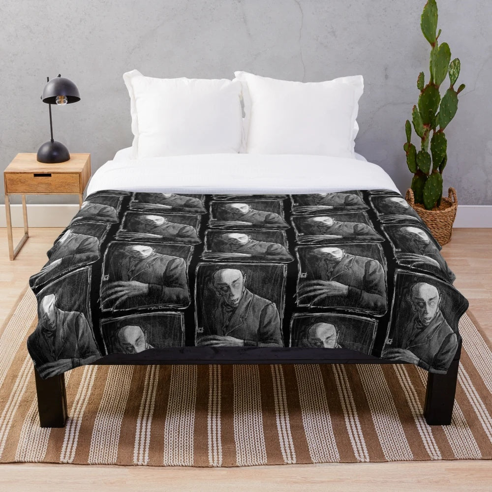 Nosferatu-inspired plush blanket with classic horror imagery