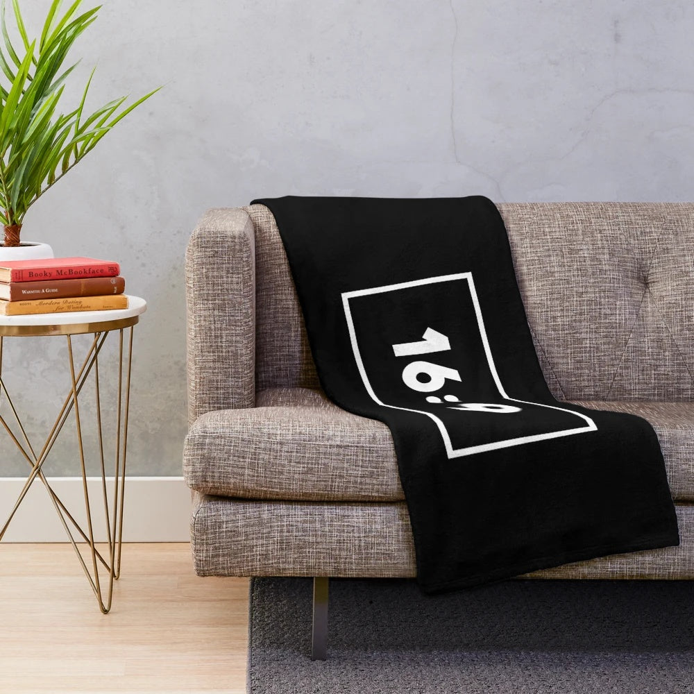 Soft and cozy plush blanket with a cinema-inspired design