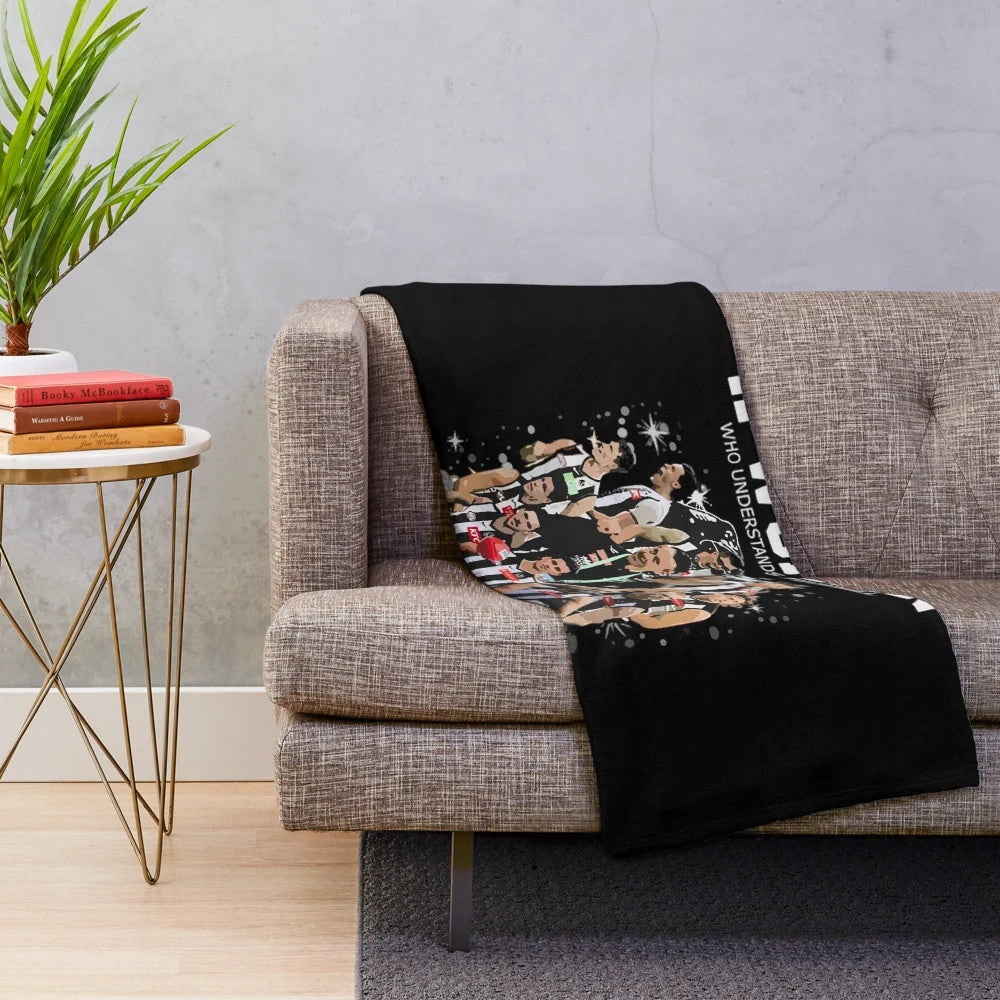 Collingwood plush blanket featuring the team's colors and logo