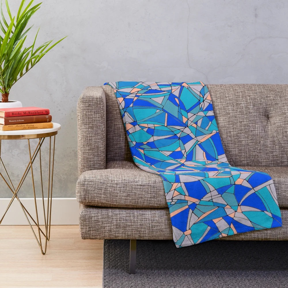 Vibrant abstract circles pattern on a soft, cozy plush blanket