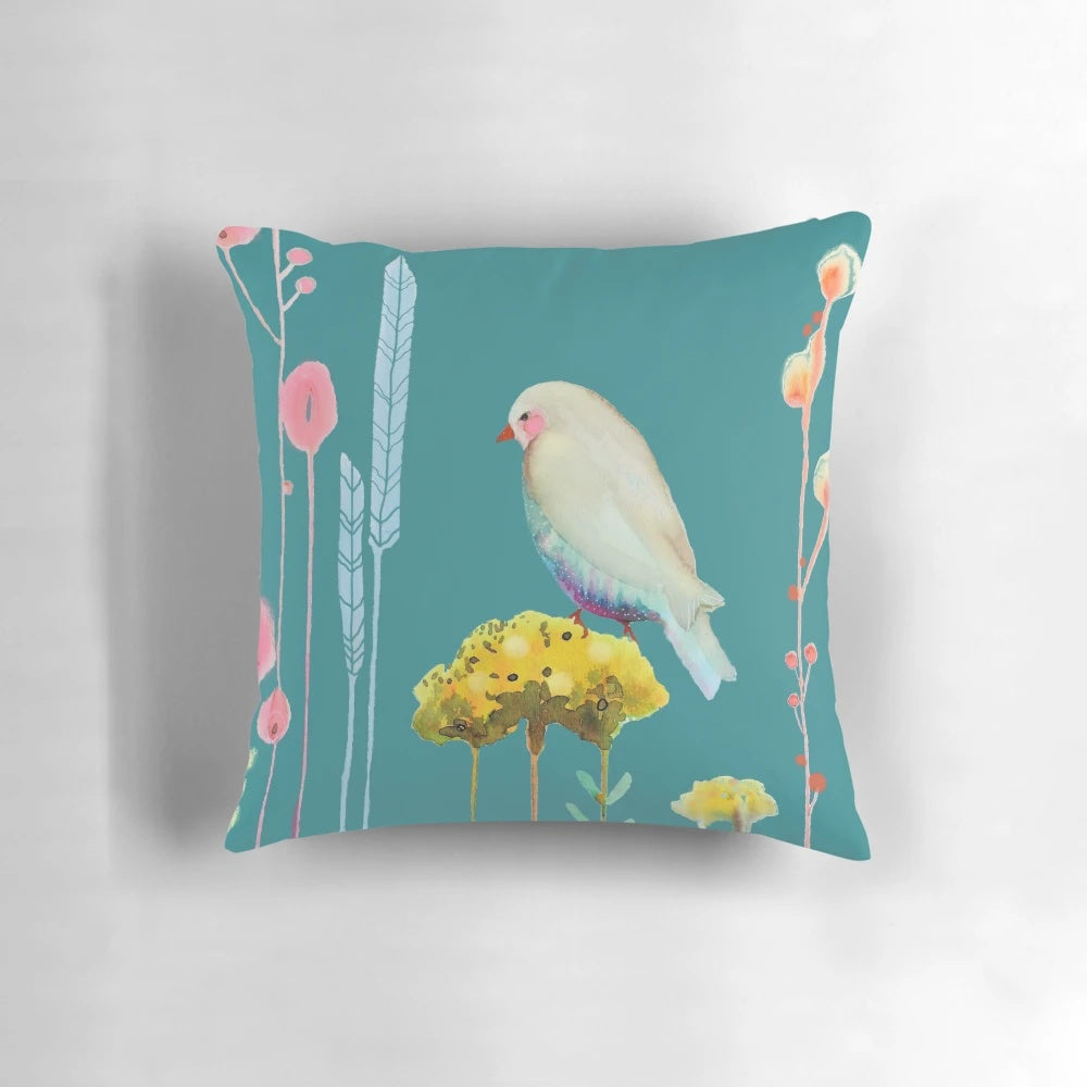 Colorful and serene decorative pillow with bird, flower, and leaf motifs
