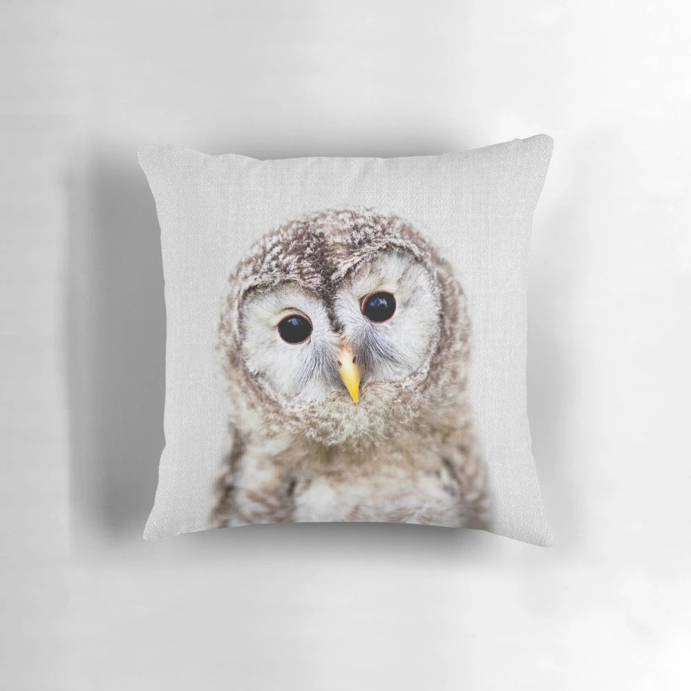 Vibrant portrait of a baby owl against a minimalist background, perfect for nursery, kids room or modern home decor.