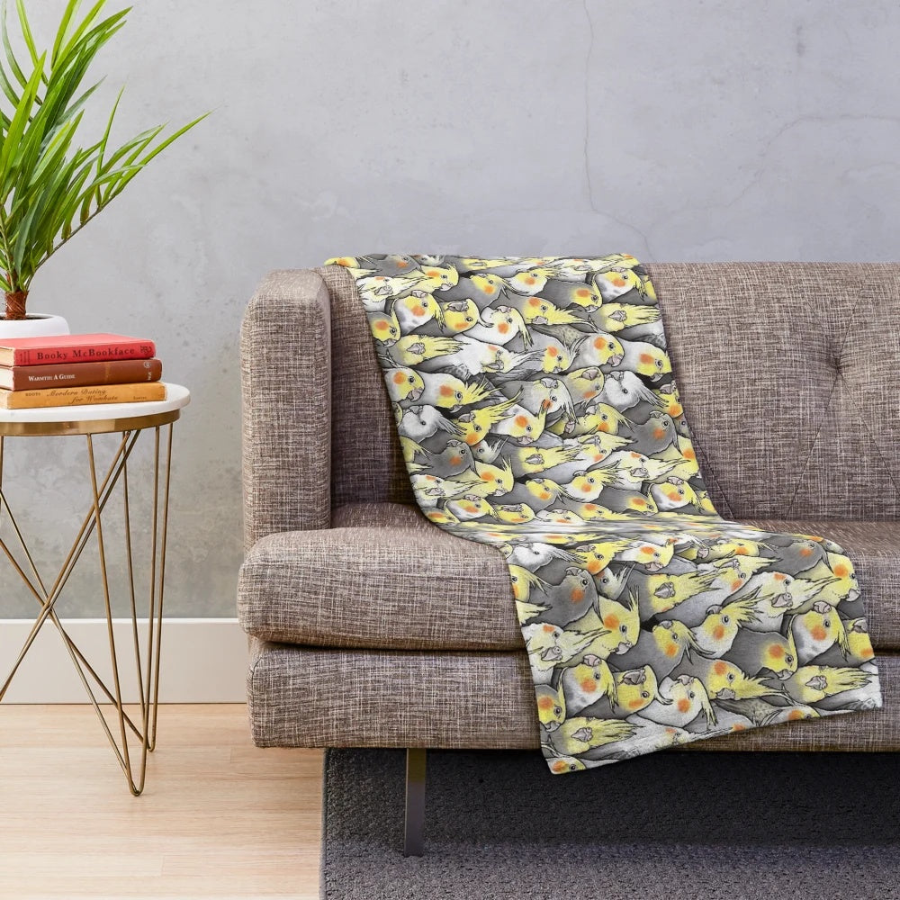 Soft and cozy plush blanket featuring a vibrant cockatiel design