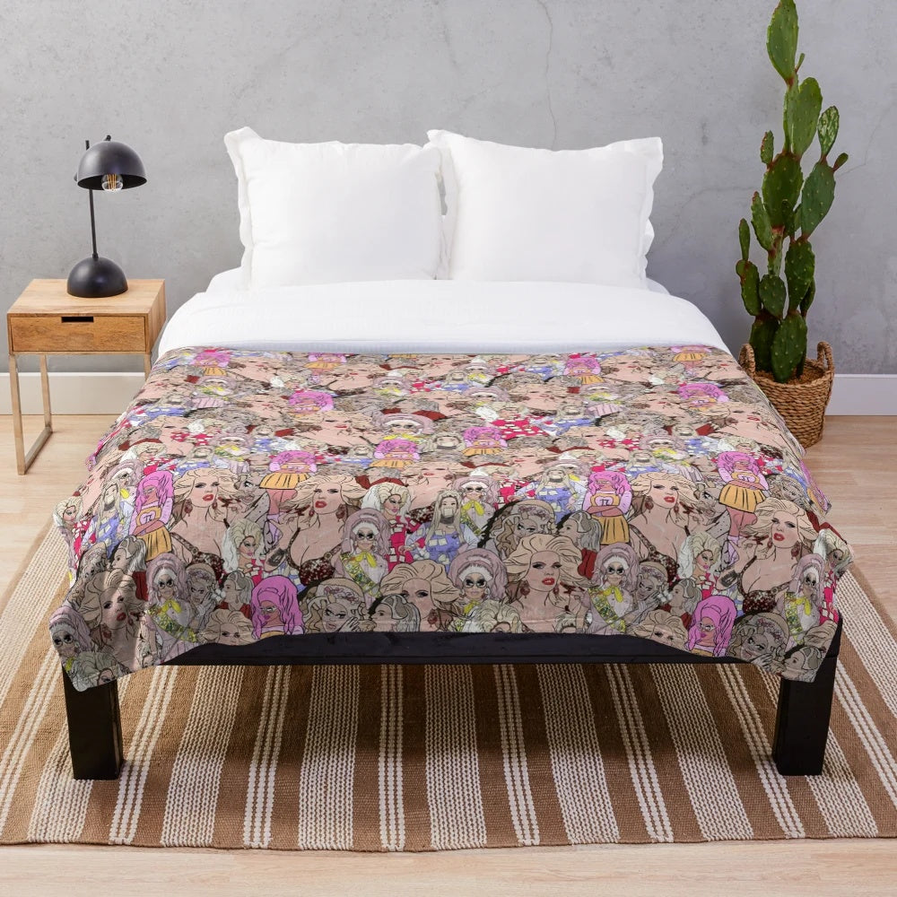 Colorful plush blanket featuring a pop art pattern of drag queens Trixie Mattel and Katya Zamolodchikova