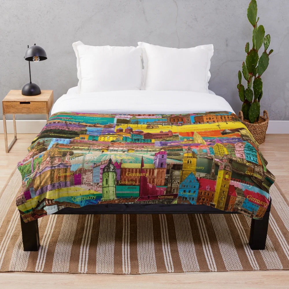 Colorful plush blanket featuring a digital collage of Germany's architecture and sights