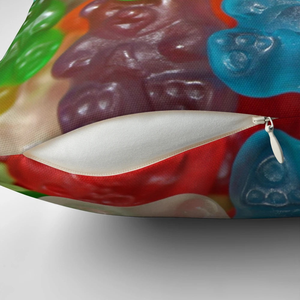 Vibrant gummy bear-shaped pillow in a rainbow of colors