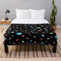 Macarons pattern plush blanket with vibrant colors and soft texture
