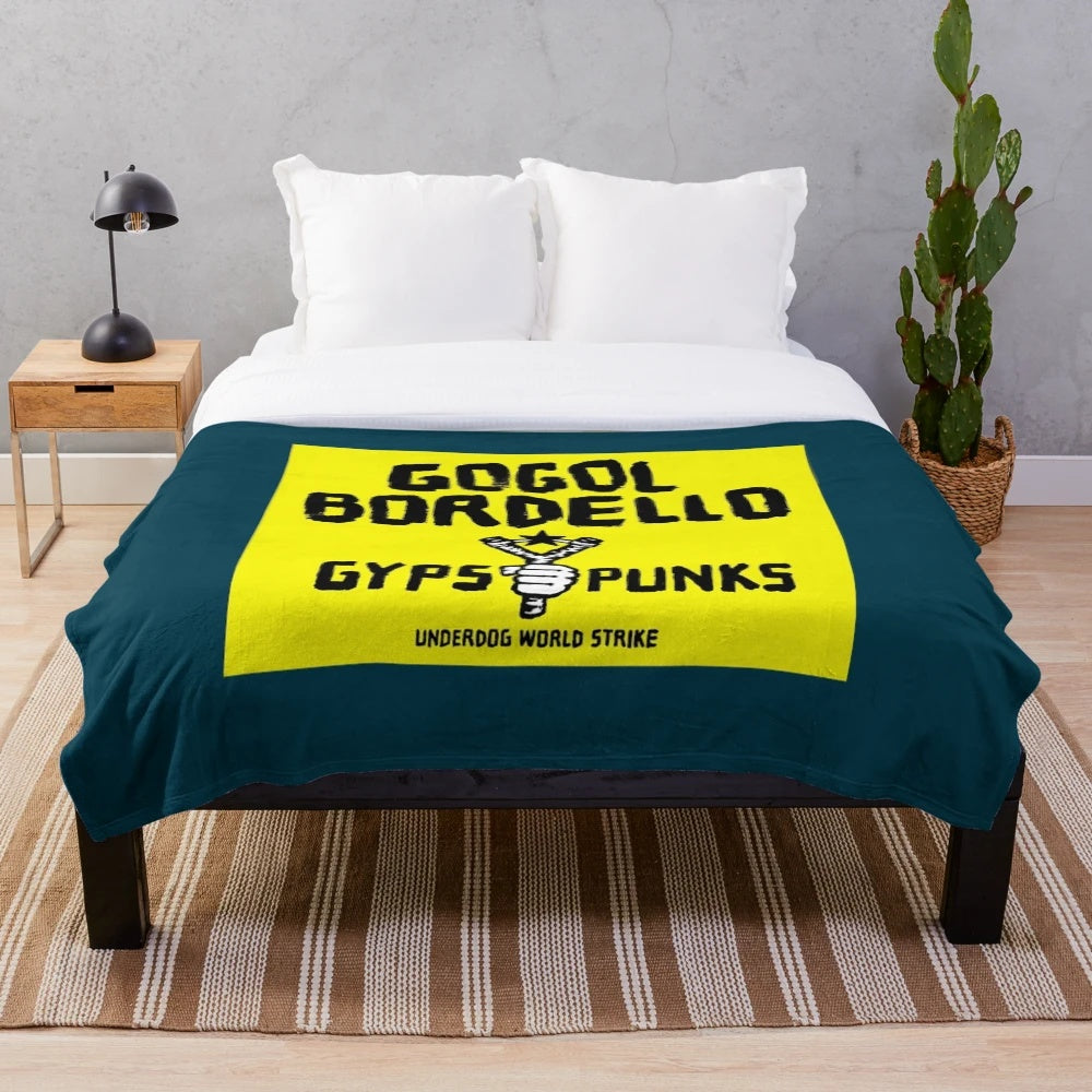 Colorful plush blanket featuring the Gogol Bordello band logo and design