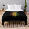 Vibrant plush blanket featuring a Rastafarian flag design with a stylized rasta lion graphic
