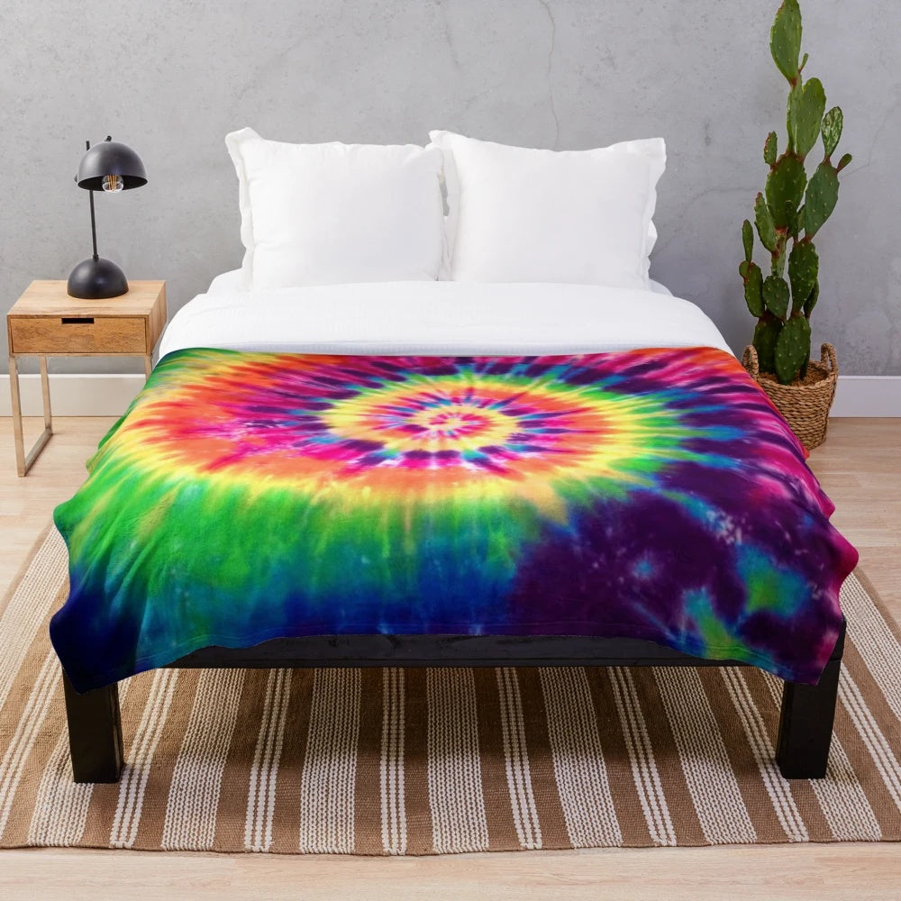 Tie dye plush blanket with vibrant rainbow colors