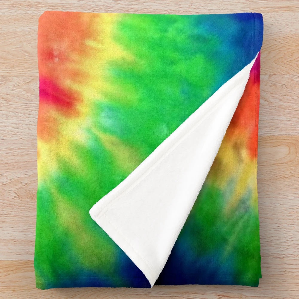 Tie dye plush blanket with vibrant rainbow colors