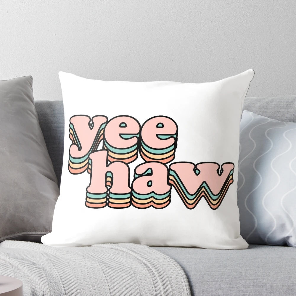 Vibrant "Yee Haw" themed pillow with country music references