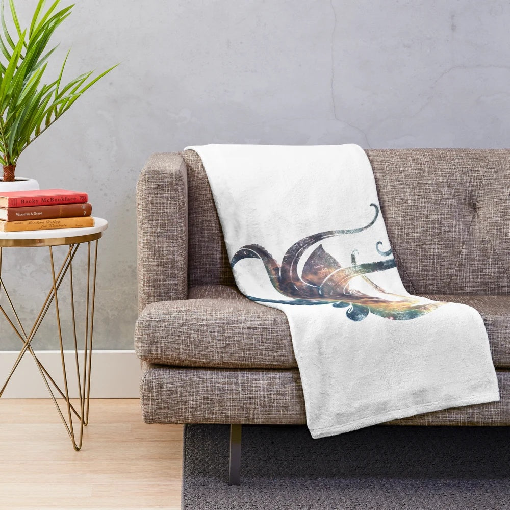 Plush blanket featuring a cozy octopus design against a starry night sky backdrop