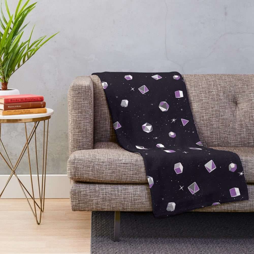 Plush purple and black blanket with polyhedral dice pattern, ideal for dice enthusiasts and TTRPG fans