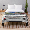 Plush blanket featuring a collage of iconic British trains and locomotives