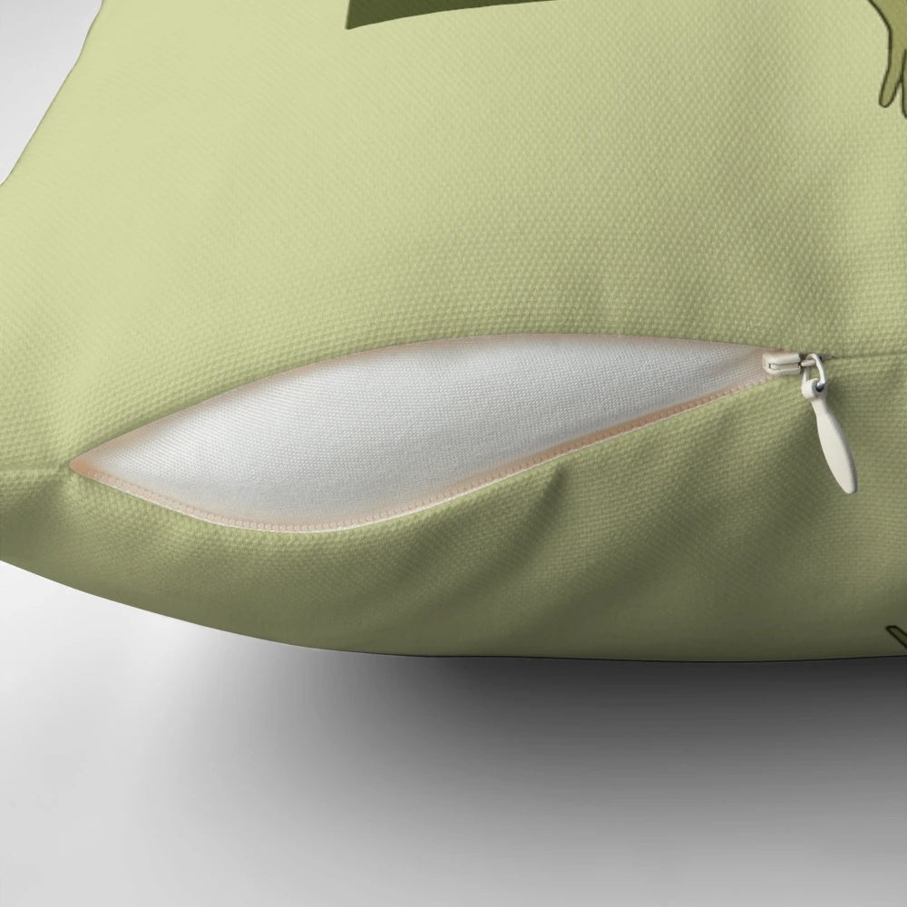 A whimsical cottagecore-style pillow design featuring a frog playing a banjo on a mushroom in a vintage, goblincore-inspired garden setting.