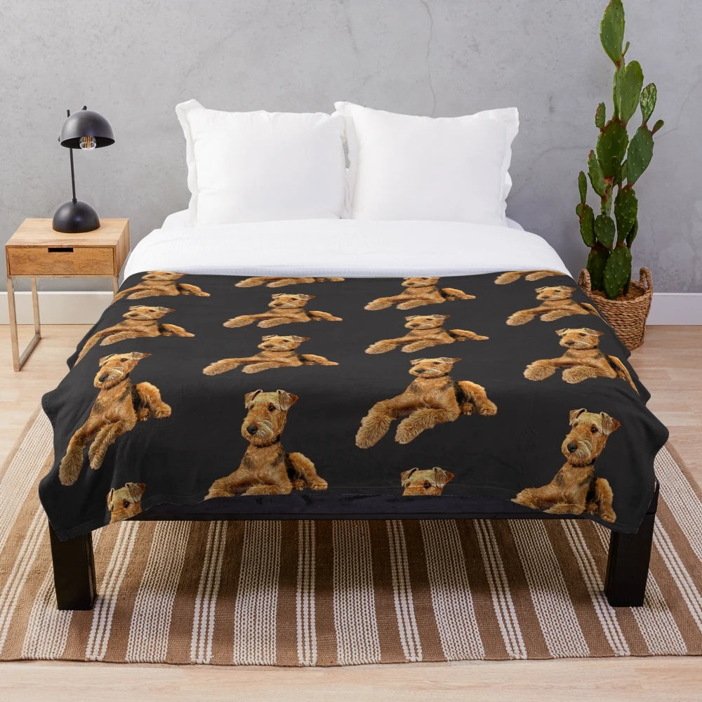 Airedale Terrier dog illustration on a plush blanket