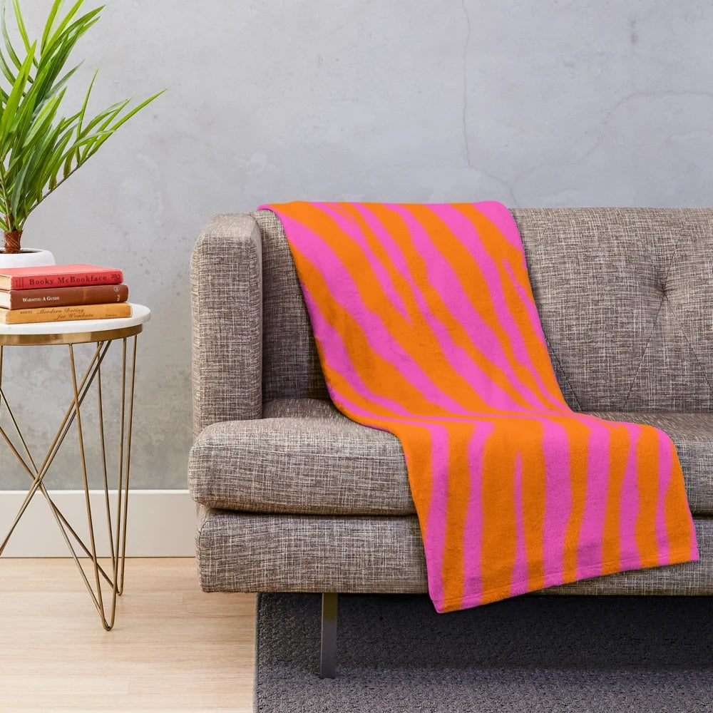 Pink and orange zebra print plush blanket