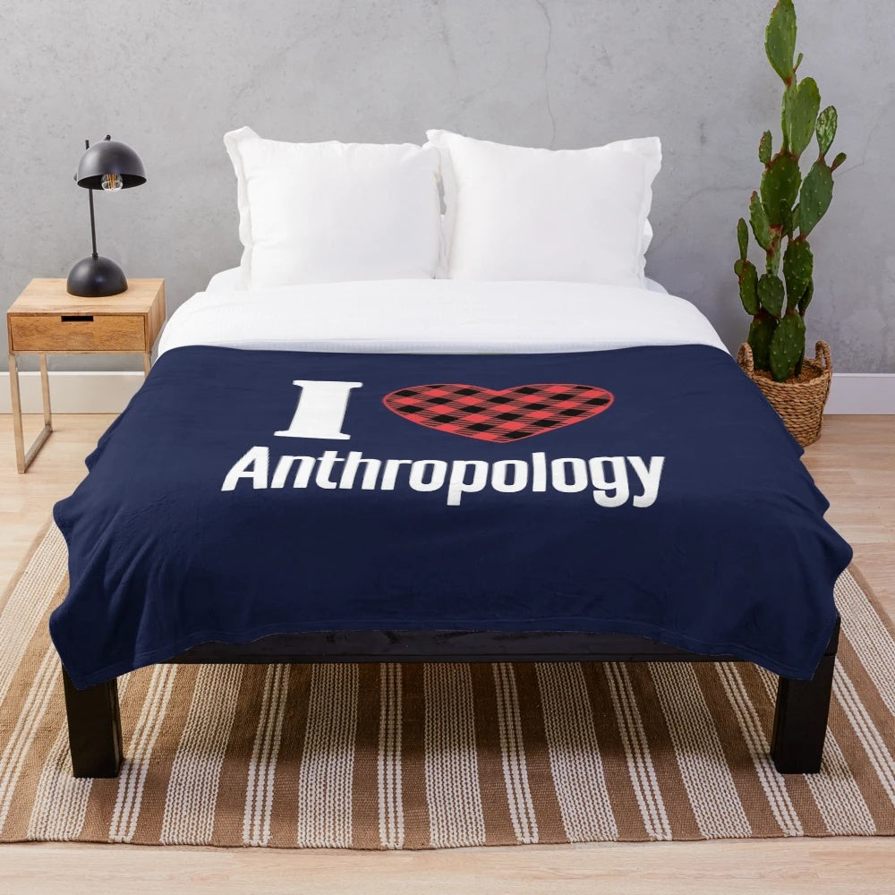 Anthropology plush blanket with a heart design