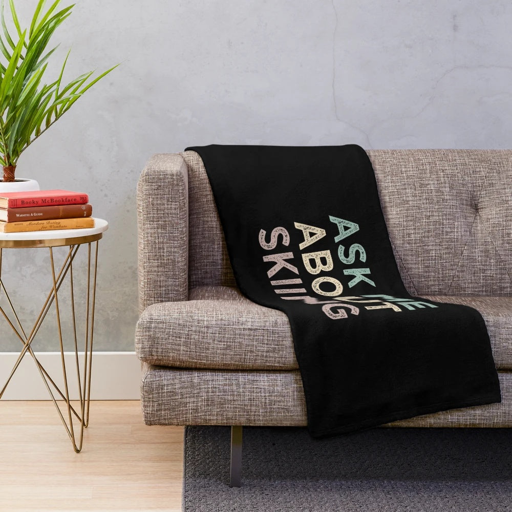 Skiing-themed plush blanket for ski enthusiasts
