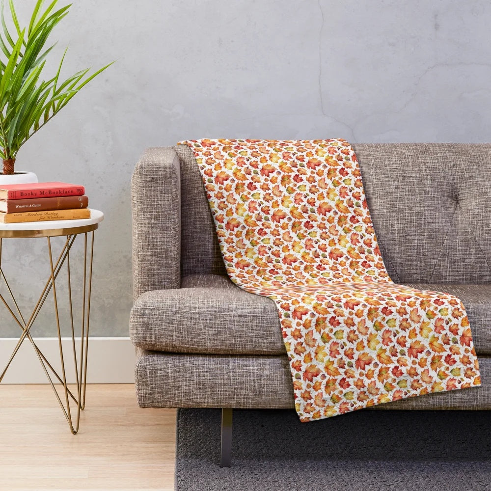 Plush autumn leaves blanket in warm, cozy colors