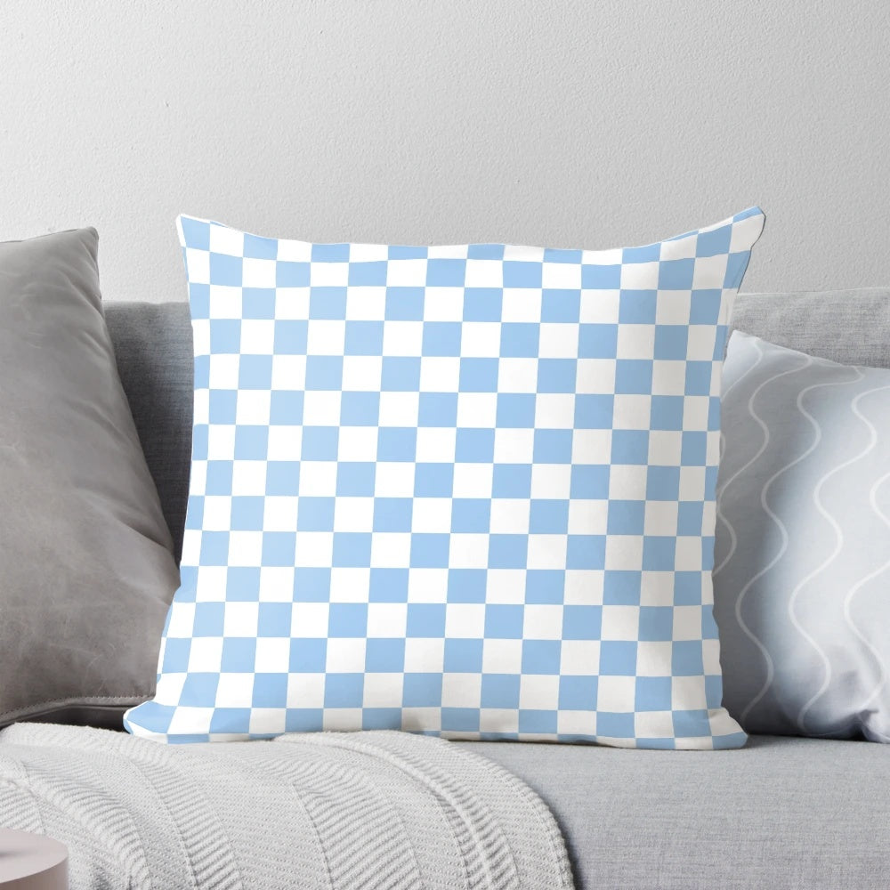 Soft and plush baby blue and white checkered throw pillow for nursery, bedroom, or living room decor.