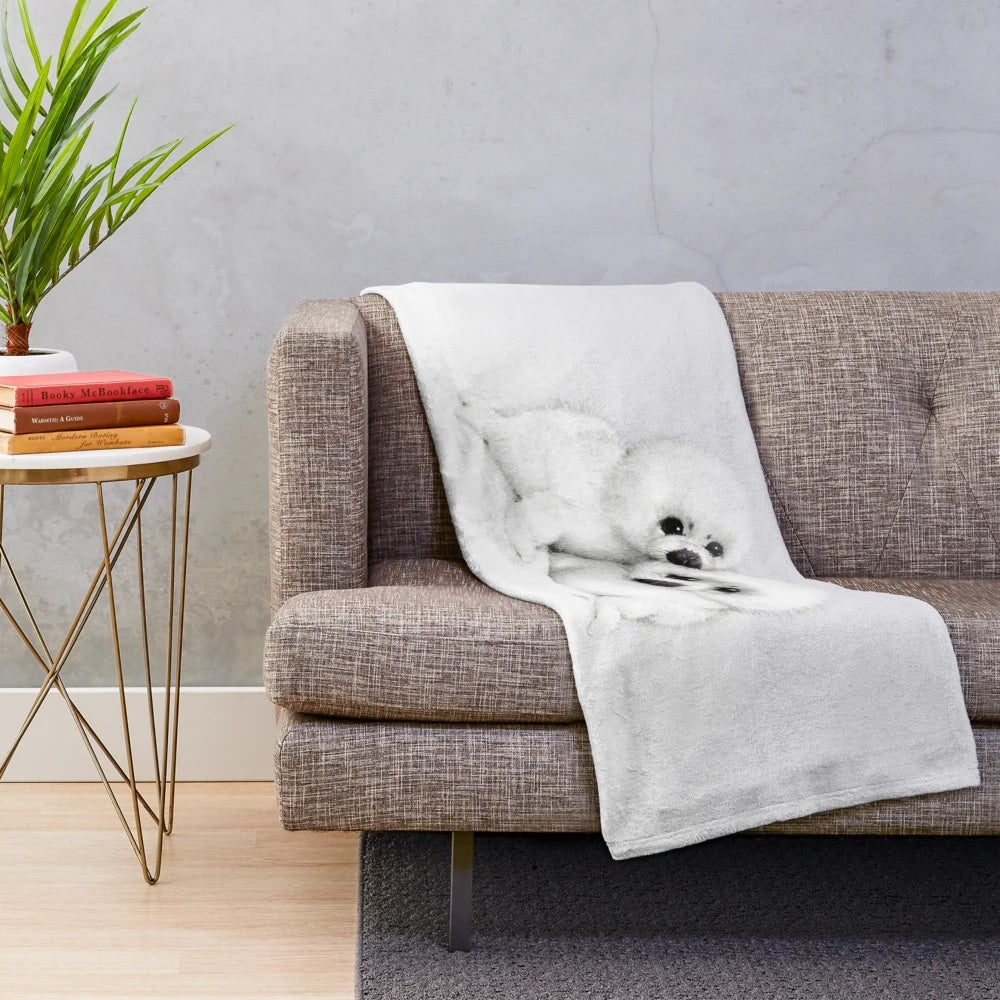 Soft and cuddly baby seals plush blanket, perfect for snuggling