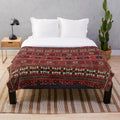 Antique-inspired plush blanket with Baluch flatweave rug design