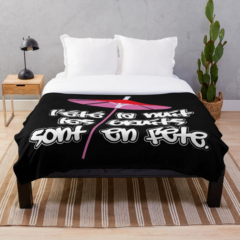 Beach umbrella-inspired plush blanket for outdoor relaxation